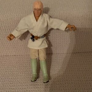 Action Figure with White Tunic and Green Boots